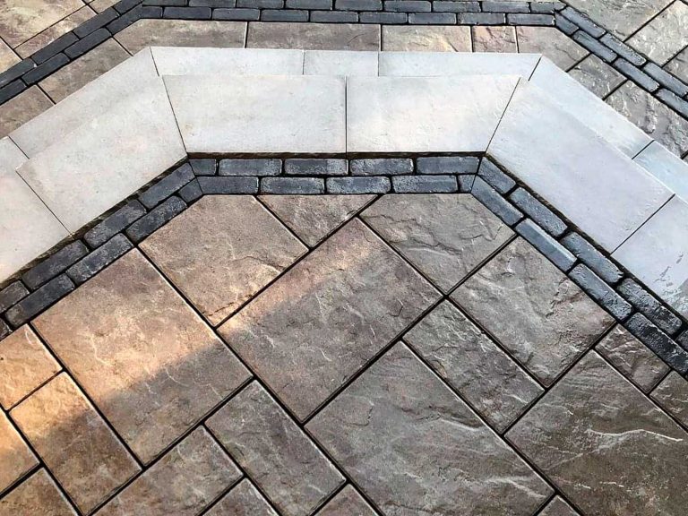 Front porch made with brick installed by BlackDiamondDesign Landscaping